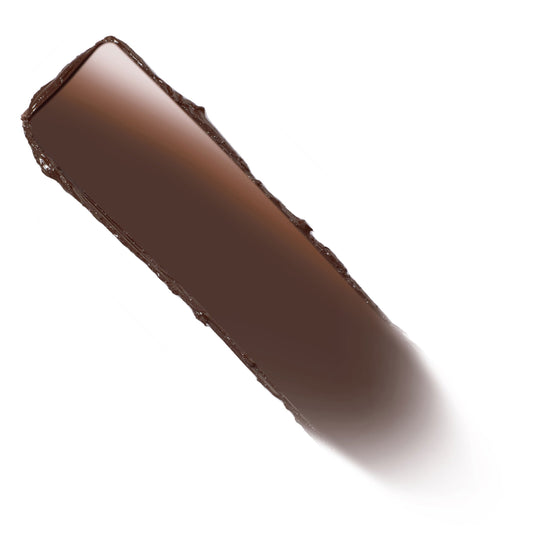 Deep chocolate-brown ColourPop Lippie Stix swatch - Oh, Behave - glides in a smooth, creamy swipe with a subtle sheen, shown diagonally on a clean white background.