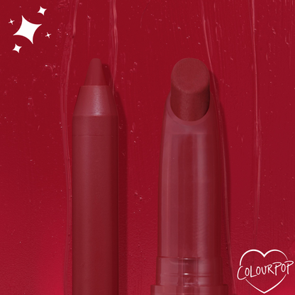 ColourPop Lippie Pencil in Bichette stands uncapped beside the matching Lippie Stix on a glossy deep red swatch background with sparkle accents and a heart-shaped ColourPop logo, showcasing its rich wine-red shade and precise tip.