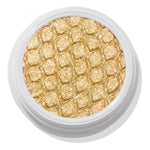 ColourPop Cheap Date Super Shock Shadow, a metallic warm gold shimmer eyeshadow with a honeycomb-embossed texture, sparkling in a round white pot viewed top-down on a white background.