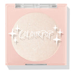 Cold One highlighter compact showcasing a shimmering icy pearl pan behind a clear lid with white sparkle icons and ColourPop logo, closed in a blush‑pink square case on a white background; ColourPop Pressed Powder Highlighter.