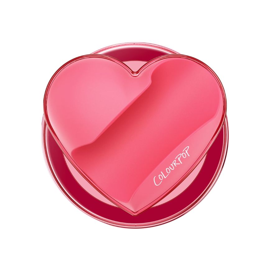 Heart-shaped pink PopSockets phone grip featuring the ColourPop logo, shown front-facing with a glossy finish on a white background, from the ColourPopSockets collab by ColourPop.
