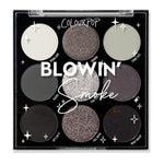 Blowin’ Smoke shadow palette showcasing nine cool‑toned shades - white, silver, graphite, and black - in matte, shimmer, and glitter finishes arranged 3x3 in a black compact with clear lid; ColourPop Shadow Palette for bold smoky eyes.