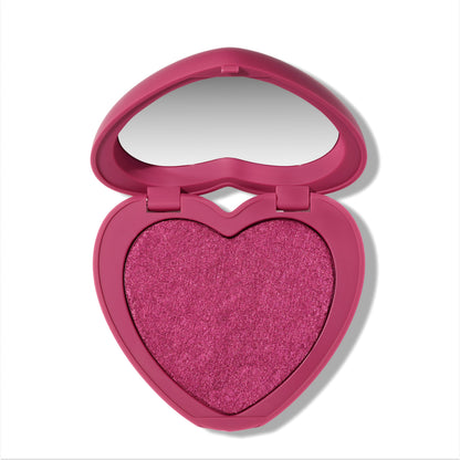 Heart to Get Cuter than Cupid Super Shock Blush compact showing a shimmery hot pink heart-shaped blush pan inside a matching heart case with mirror, styled on a clean white background for US makeup lovers