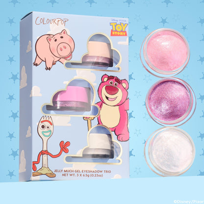 ColourPop Jelly Much Shadow Play All Day trio showcasing three shimmery gel eyeshadows - pearl pink, vibrant magenta, and icy white - lined in open pots beside a Disney Pixar Toy Story sky-blue box with Hamm, Lotso, and Forky; set includes 3 x 6.5g jars.