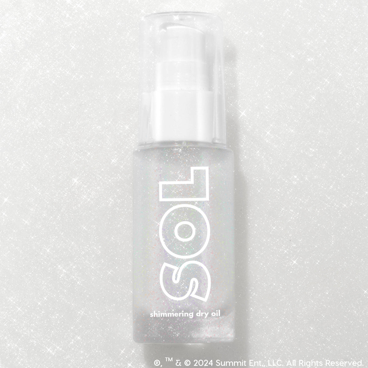 Like Diamonds pump bottle displaying iridescent micro-shimmer through frosted glass with bold white SOL logo, ColourPop SOL Shimmering Dry Oil, standing upright on a silver glitter backdrop that enhances the sparkle for a luminous body glow.