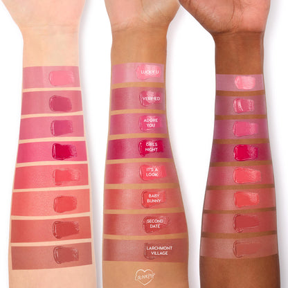 Larchmont Village swatch - rich brown‑nude - shown on three arms, highlighting the dewy, balmy finish and pigment of the ColourPop Lip and Cheek Balm, with labeled shade lineup for comparison across light to deep skin tones.