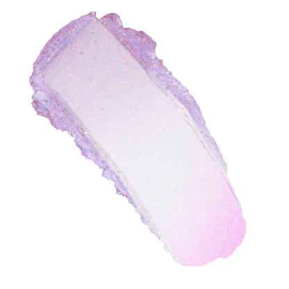 Shimmering clear-to-pink swatch of Transform pH Lip Balm, a color-changing balm with iridescent microglitter, shown as a smooth smear on a white background for texture detail; ColourPop pH Lip Balm.