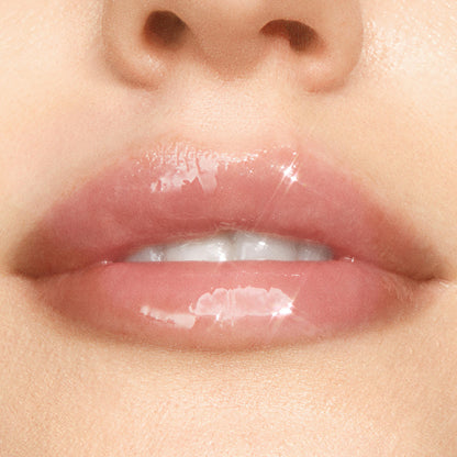 Glossy pink lips wearing ColourPop Dream Duo Ultra Lip Duo, showing a high-shine, sheer tint and hydrated finish in a tight close-up of the mouth and nose on natural skin.