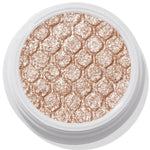 ColourPop Ritz Super Shock Shadow shimmering in a white round pot, its honeycomb-embossed, metallic champagne-beige glitter cream-to-powder formula catching light in a close-up product shot on a clean background.