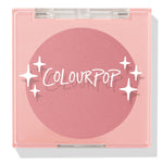 Sassy Pants ColourPop Pressed Powder Blush compact showcasing a rosy matte pan, closed with a clear lid and white star accents over the logo, set in a square light-pink plastic case on a clean white background.
