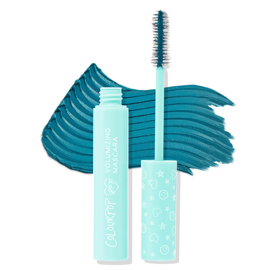 ColourPop BFF Mascara in Swell Season, wand coated in deep teal volumizing formula, stands beside an open mint tube with white logo and patterned cap, with a bold teal swipe behind to show pigment and payoff.