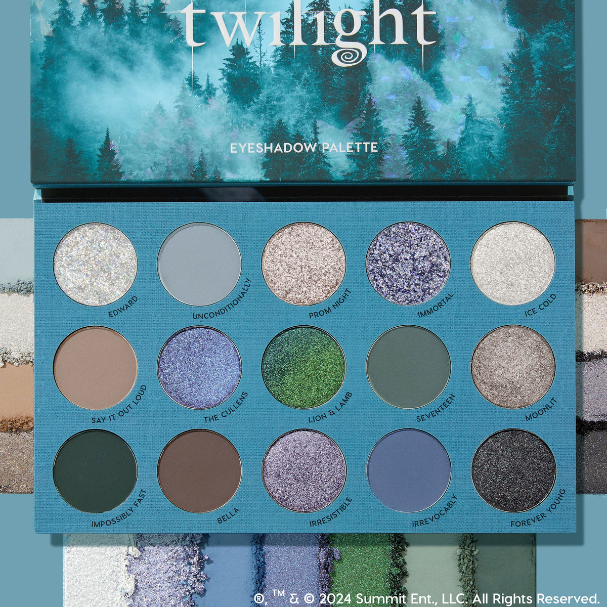 Twilight ColourPop Shadow Palette opens to 16 cool‑toned mattes and metallics - silver glitter, icy white, lilac, periwinkle, emerald, taupe, slate, charcoal - arranged in a 4x4 grid with shade names, a misty-forest lid, and swatches framing the edges.