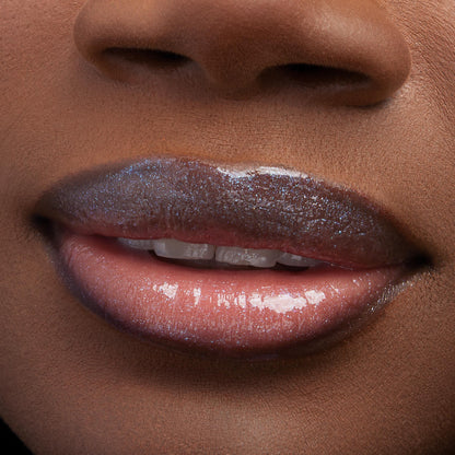 Lips wearing Favorite Deputy Ultra Glossy Lip gleam with a glassy, micro‑shimmer finish, reflecting light in a tight macro close-up that showcases the smooth, hydrated shine of ColourPop Ultra Glossy Lip.