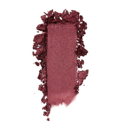 ColourPop Drift Super Shock Shadow swatch, a metallic cranberry-burgundy eyeshadow, smeared in a rectangular stroke with crumbled edges on a white background to showcase its shimmery, high-pigment finish.
